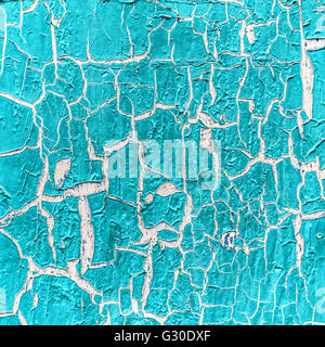 cracked paint on the concrete wall Stock Photo
