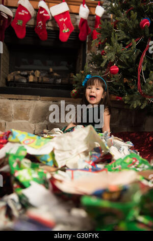 Child screaming cause she has no more gifts to unwrap Stock Photo