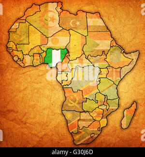 nigeria on actual vintage political map of africa with flags Stock Photo