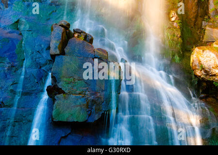 Beautiful and colorful close up of rock and water fall Stock Photo