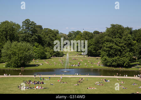 Frederiksberg, Denmark - June 5, 2016: People enjoying the sunshine in Frederiksberg park on a Sunday afternoon. Stock Photo