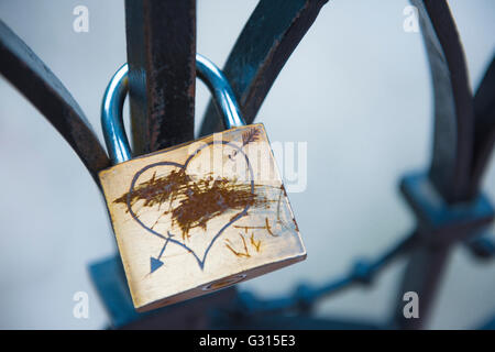 Break up, view of a 'love lock' with its lovers' names scratched out, implying the break up of a relationship, Budapest, Hungary. Stock Photo