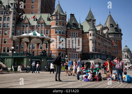 QUEBEC CITY - MAY 23, 2016: The Dufferin Terrace overlooks the St. Lawrence River right by the Château Frontenac. This terrace w Stock Photo