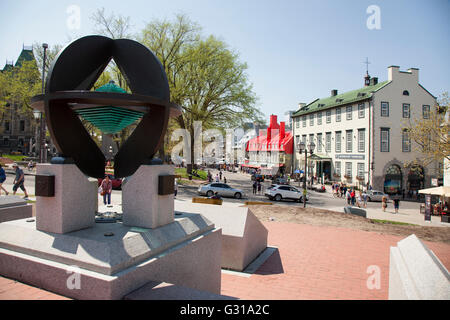 QUEBEC CITY - MAY 23, 2016: The UNESCO Monument, made of bronze, granite, and glass, commemorates Old Québec's designation as a Stock Photo