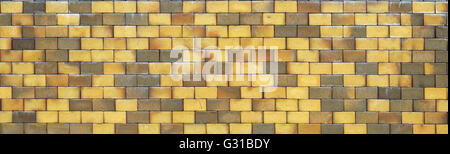 Wall from yellow burned clay bricks panoramic fragment Stock Photo