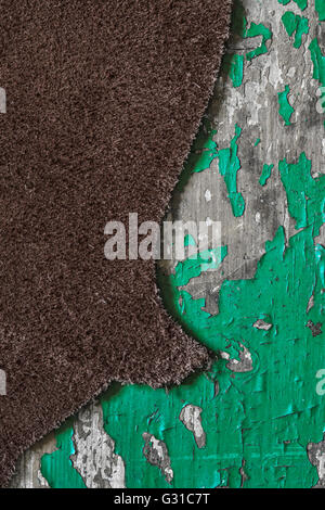 Brown suede leather and peeling paint. Stock Photo
