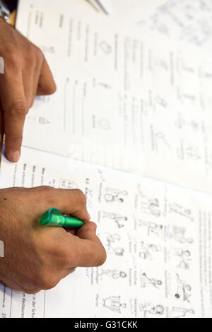 Bremen, Germany, Syrian refugee at German lessons Stock Photo