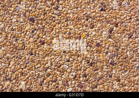 pebble stones surface wall texture background Stock Photo