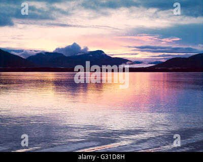 Sunset at Glacier Bay, Alaska. Sunset reflection in the calm waters of Glacier Bay. Stock Photo