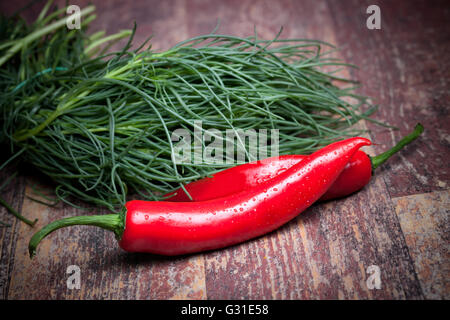 Agretti And Chili Peppers Stock Photo