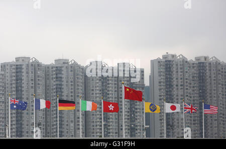 Hong Kong, China, National flags of different countries waving in the wind, the Chinese over all Stock Photo