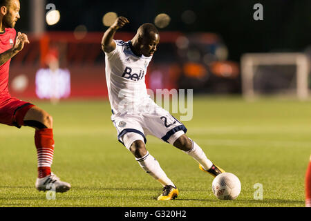 June 01, 2016: Vancouver Whitecaps forward Kekuta Manneh (23) kicks the ball towards the net during the Amway Canadian Championship match between Vancouver Whitecaps and Ottawa Fury FC at TD Place Stadium in Ottawa, ON, Canada. Ottawa Fury FC won the first leg of the semifinal 2-0. Daniel Lea/CSM Stock Photo