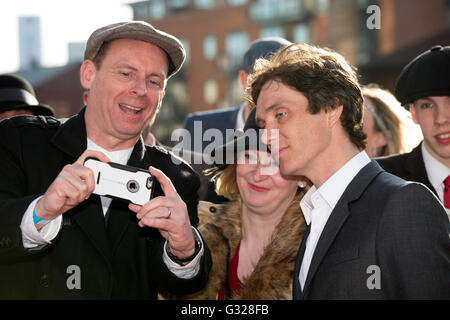 Cillian Murphy, right, who Plays Tommy Shelby in Peaky Blinders at the premiere of series three at the Mailbox in Birmingham Stock Photo