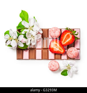Strawberry chocolate bar, pralines and apple flowers. Delicious dessert. Objects group isolated on white background Stock Photo