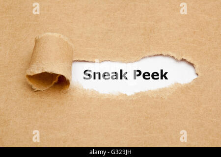 The phrase Sneak Peek appearing behind torn brown paper. Stock Photo