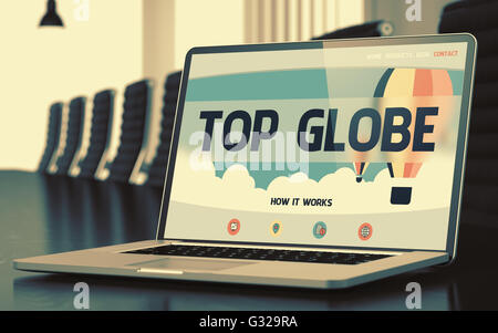 Top Globe on Laptop in Meeting Room. Stock Photo