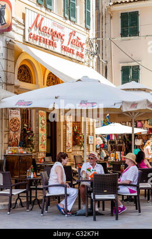 People Eating At A Restaurant In Corfu Town, Corfu Island, Greece Stock Photo