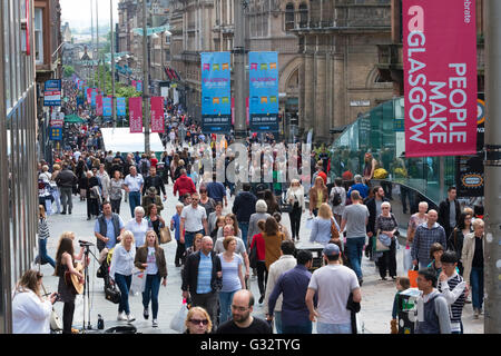 View of shoppers on busy Buchanan Street, popular shopping street,  in central Glasgow United Kingdom Stock Photo