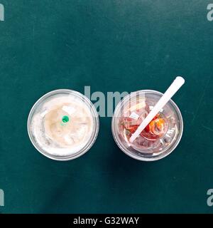 Two glasses of fresh coffee and iced tea Stock Photo