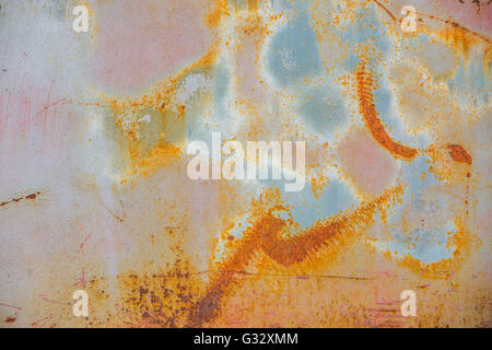 a detail of the side of a above ground gas tank.  Image looks like an abstract paintings Stock Photo