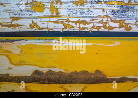 a detail image of scratches and scraps on the rear section of an excavator. Stock Photo