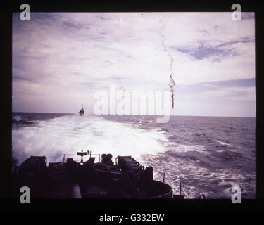 Crashing aircraft, seen from a destroyer, possibly during the Saipan campaign. Stock Photo