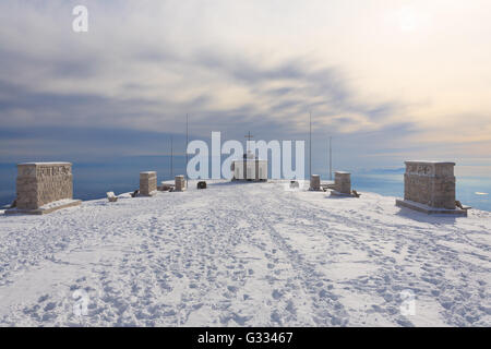 Winter panorama from Italian Alps. First world war memorial building. Snow Stock Photo
