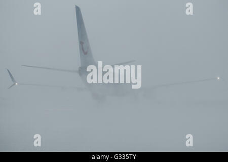 Kittilae, Finland, aircraft swirls on startup snow from the runway Stock Photo