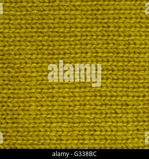 Yellow curry wool knitted fabric. Close up fragment of the top view. Stock Photo
