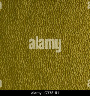 Dark lime yellow leather texture. Close up, top view. Stock Photo