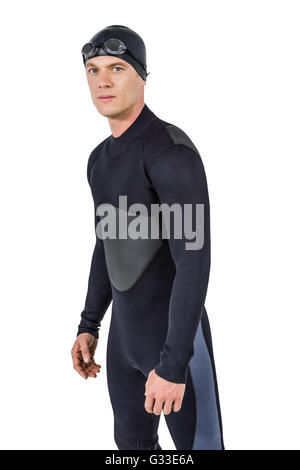 Portrait of confident swimmer in wetsuit