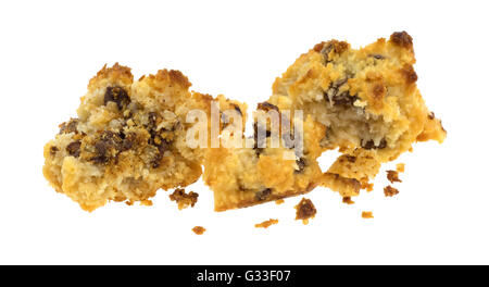 Several broken chocolate chip coconut macaroons isolated on a white background. Stock Photo