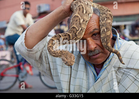 Snake charmer in Jemaa el-Fnaa square Marrakesh, Morocco Stock Photo