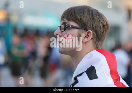 KYIV, UKRAINE - JUNE 24, 2012: England football supporter goes to the stadium before UEFA EURO 2012 Quarter-final game against Italy at NSC Olympic stadium in Kyiv Stock Photo