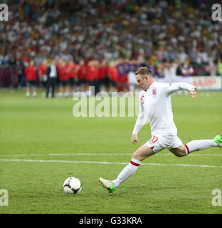 Wayne Rooney of England scores a penalty kick during UEFA EURO 2012 Quarter-final game against Italy at Olympic stadium in Kyiv Stock Photo