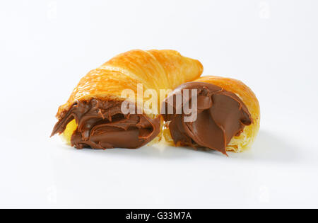 croissants with chocolate cream on white background Stock Photo