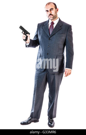 portrait of a classy businessman or mobster or security guard holding a ...