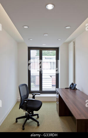 Office interior. Wolfson College Auditorium, Oxford, United Kingdom. Architect: Berman Guedes Stretton, 2013. Stock Photo