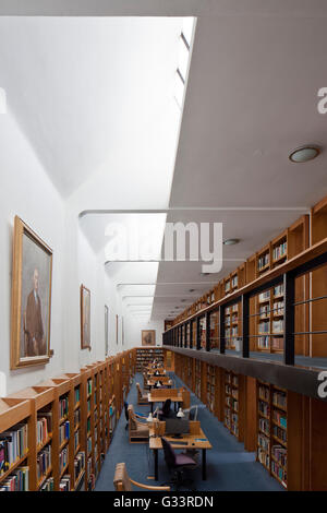 Elevated view through library. Wolfson College Auditorium, Oxford, United Kingdom. Architect: Berman Guedes Stretton, 2013. Stock Photo