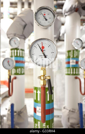 Gauge in maintenance plant. Wolfson College Auditorium, Oxford, United Kingdom. Architect: Berman Guedes Stretton, 2013. Stock Photo