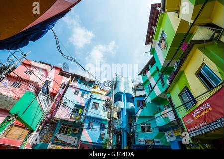 RIO DE JANEIRO - MARCH 31, 2016: Colorful buildings mark the entrance to the Santa Marta Community (favela). Stock Photo