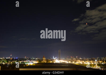 Total lunar eclipse , super moon , blood moon over the city center, Austria, Wien, 00., Wien, Vienna Stock Photo
