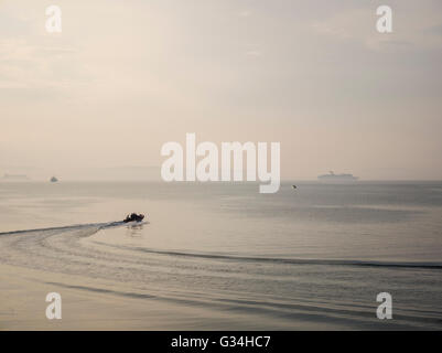 Bangor, Northern Ireland, UK. 7th June 2016. UK weather: After a dull day with light rain it brightened in the evening although a mist descended on Belfast Lough. Credit:  J Orr/Alamy Live News Stock Photo