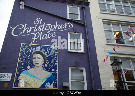 London, UK - 8 June 2016 - Oxford and Regent Street retailers gears up to celebrate HM Queens 90th birthday. Portrait of HM Queen in St Christopher's Place in Barrett Street Credit:  Dinendra Haria/Alamy Live News Stock Photo