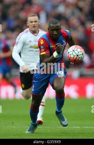 Crystal Palace’s Yannick Bolasie chases the ball during the Emirates FA Cup Final between Crystal Palace and Manchester United at Wembley Stadium in London. May 21, 2016. EDITORIAL USE ONLY. No use with unauthorized audio, video, data, fixture lists, club/league logos or 'live' services. Online in-match use limited to 75 images, no video emulation. No use in betting, games or single club/league/player publications. James Boardman / Telephoto Images +44 7967 642437 Stock Photo