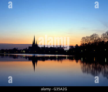 View of the Cathedral across Stowe pool at sunset, Lichfield, Staffordshire, England, UK, Western Europe. Stock Photo