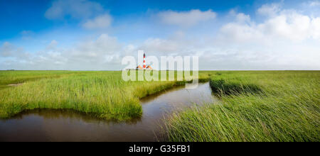 Beautiful landscape with famous Westerheversand lighthouse at North Sea in Nordfriesland, Schleswig-Holstein, Germany Stock Photo