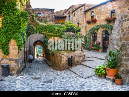 Beautiful view of idyllic alley way in famous Civita di Bagnoregio near Tiber river valley, Lazio, Italy Stock Photo