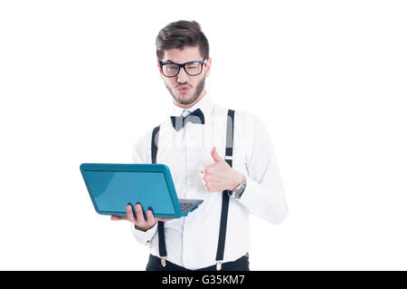 Businessman holding laptop and making the ok gesture. Isolated on white background Stock Photo