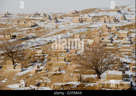 CHINA province Xinjiang, prefecture Kaxgar, Shufu County, uighur town Upal at Karakoram highway, old muslim cemetery during winter Stock Photo